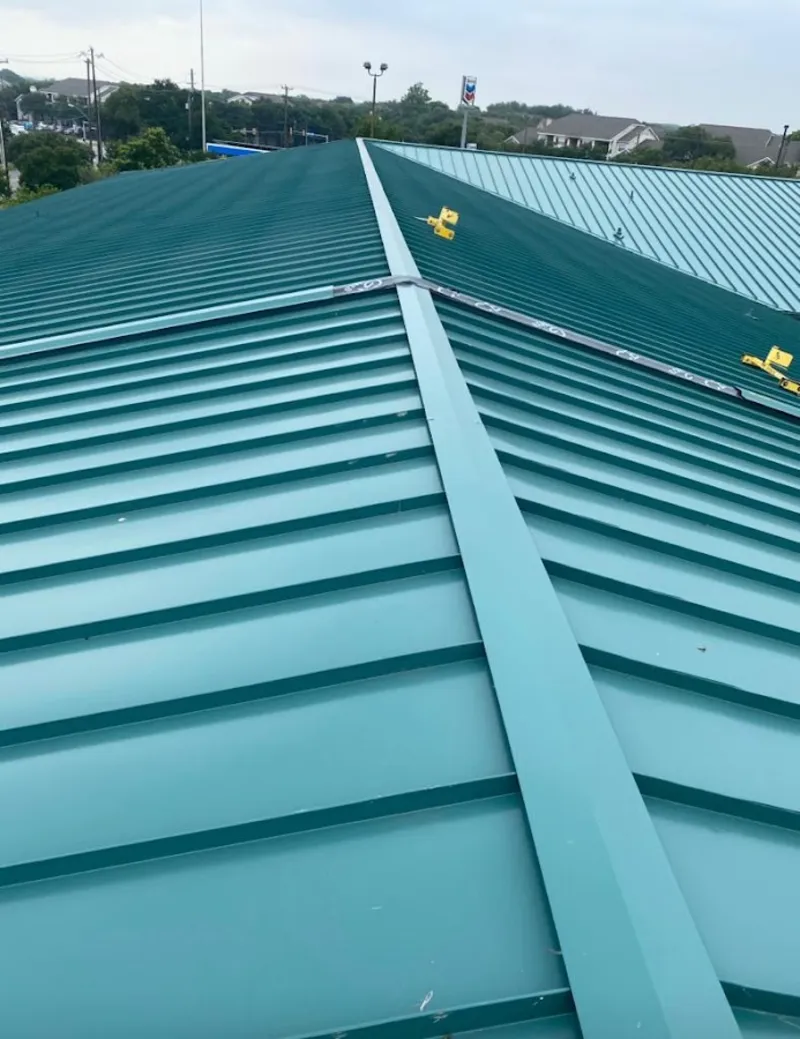 Green commercial metal roof ridge and valley for Metal Roof Repair in La Homa